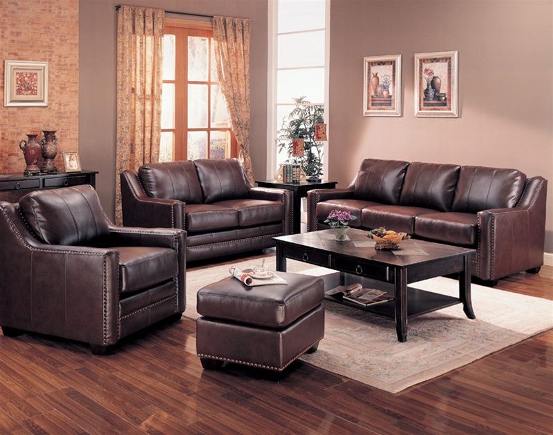 living room with brown leather
